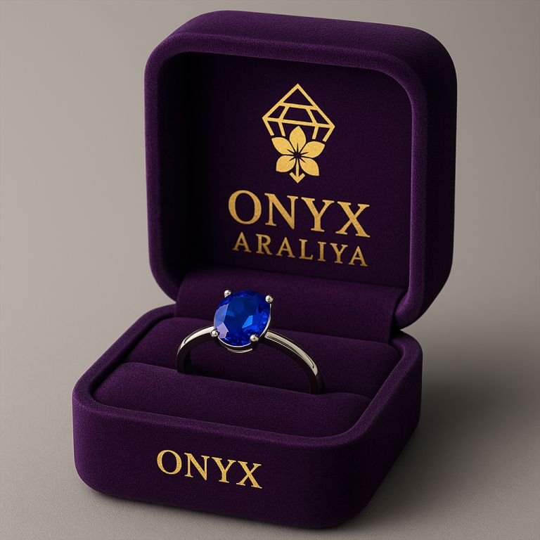 Azure Grace Ring – Elegant blue sapphire-inspired centerpiece with silver accents.