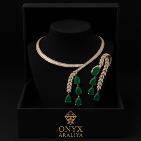 Verdant Glow Chain – Green emerald-style gem with intricate detailing.