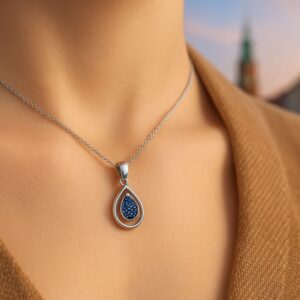 Sapphire Serenity Pendant – A calming blue gemstone on a sleek chain